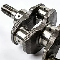 Close-up of Toyota crankshaft journal surface and oil passage holes
